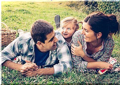 Happy family in the grass