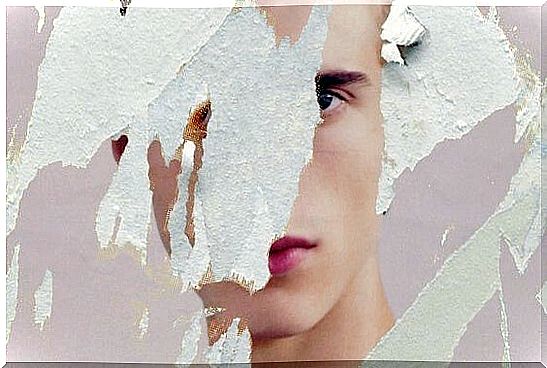 Torn poster of a face