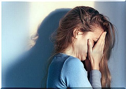 Woman crying because she is the victim of emotional abuse