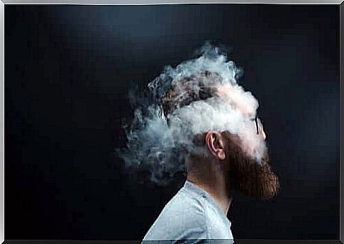 An image of a man with smoke around his head