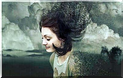 A woman with clouds in the background