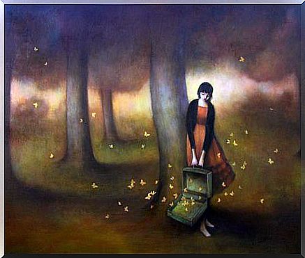 Girl with a suitcase full of butterflies