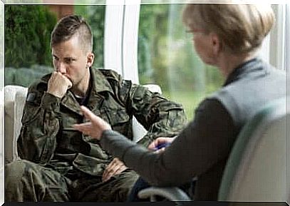 A soldier talks to a therapist